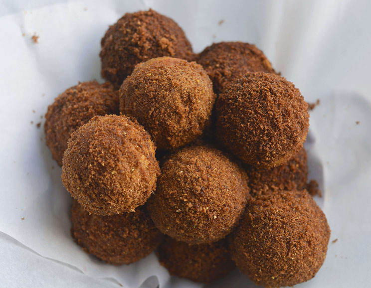 To make these gingerbread donut holes thick and dense, the batter is made from a hearty combination of sweet potato purée, cassava flour and almond flour.